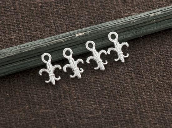 4 of 925 Sterling Silver Fleur de lis Charms 6x7 mm.