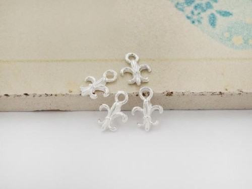 4 of 925 Sterling Silver Fleur de lis Charms 6x7 mm.