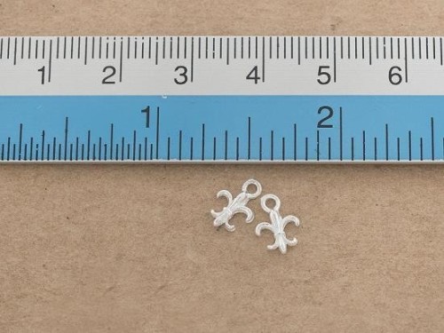 4 of 925 Sterling Silver Fleur de lis Charms 6x7 mm.