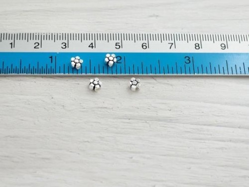 4 of 925 Sterling Silve Little Flower Beads 4.5mm.