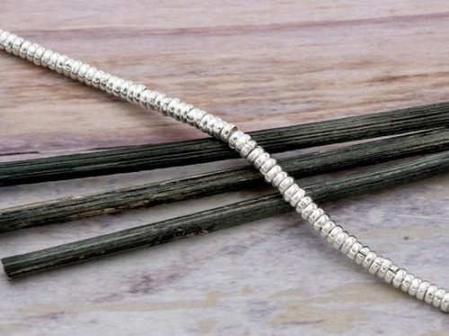 130 of Karen Hill Tribe Silver Little Ring Beads 2.5x1 mm.